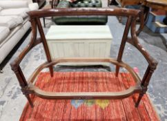 Mahogany sofa frame with carved decoration in places, raised on turned front legs, 89cm high