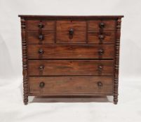 19th century mahogany chest of drawers, possibly Scottish, having a central top hat drawer flanked