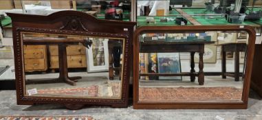 Oak framed wall mirror with bevelled plate, the frame with arched top, carved swag and scalloped