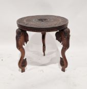 20th century Indian hardwood elephant coffee table of circular form, with carved decoration