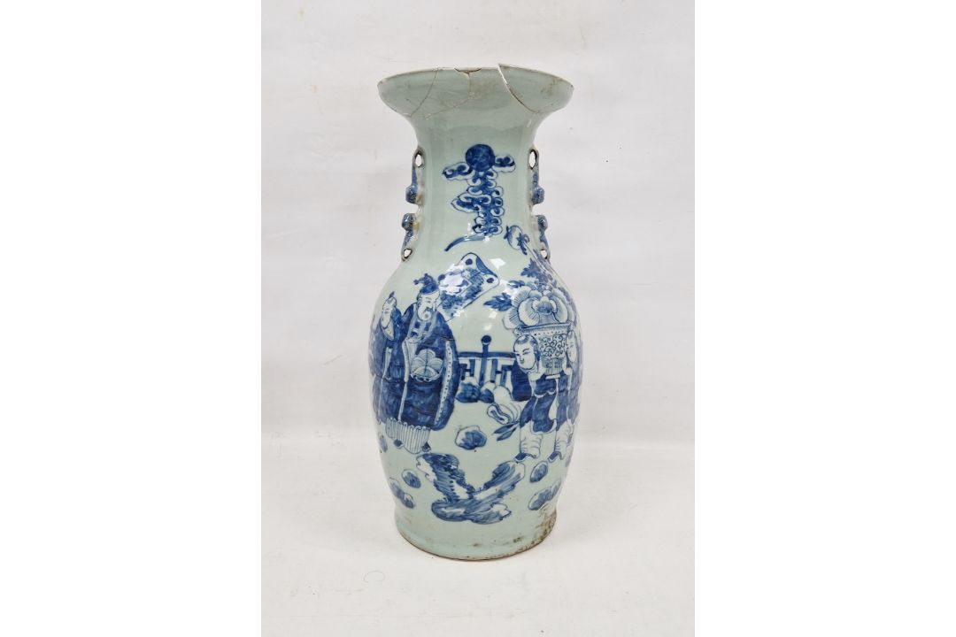 Late 19th century Chinese baluster celadon ground vase, with flared rim, applied with mythical beast