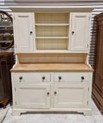 Contemporary cream-painted pine kitchen dresser, the top section having two single door cupboards