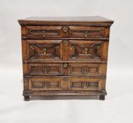 Antique oak, possibly late 17th century, chest of four long drawers, all with geometric moulding,