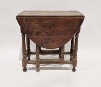 Late 19th/early 20th century oak gateleg dining table, 73cm high x 77cm wide x 41cm deep when folded