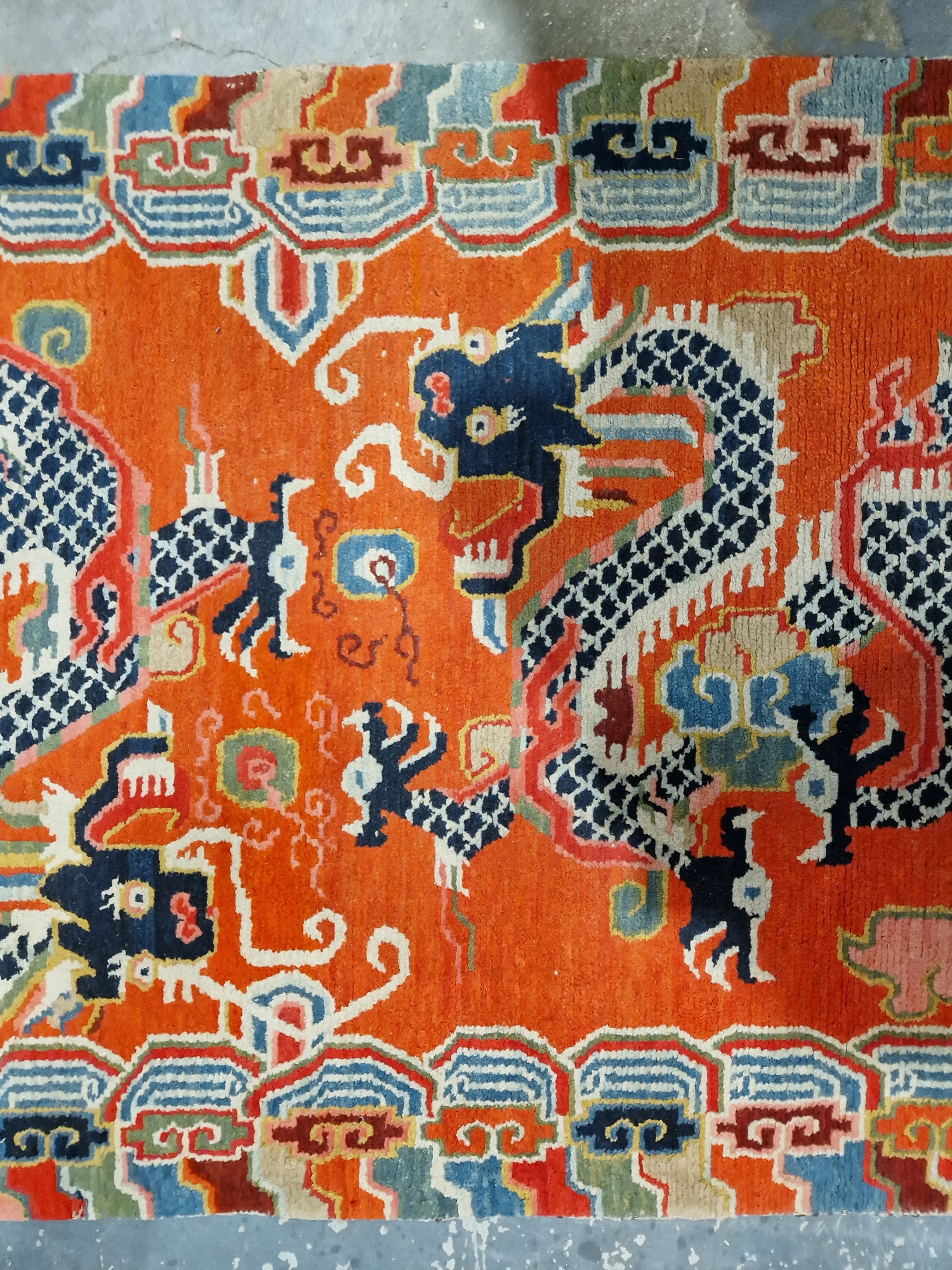Pair of Chinese style rugs, possibly Tibetan, the central panel with two dragons chasing flaming - Image 64 of 88