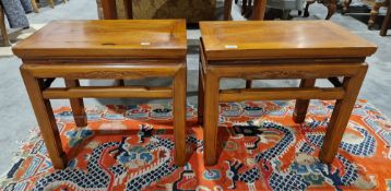 Pair of Chinese hardwood side tables, with carved decoration, 48.5cm high, 52cm long, 33cm wide (2)