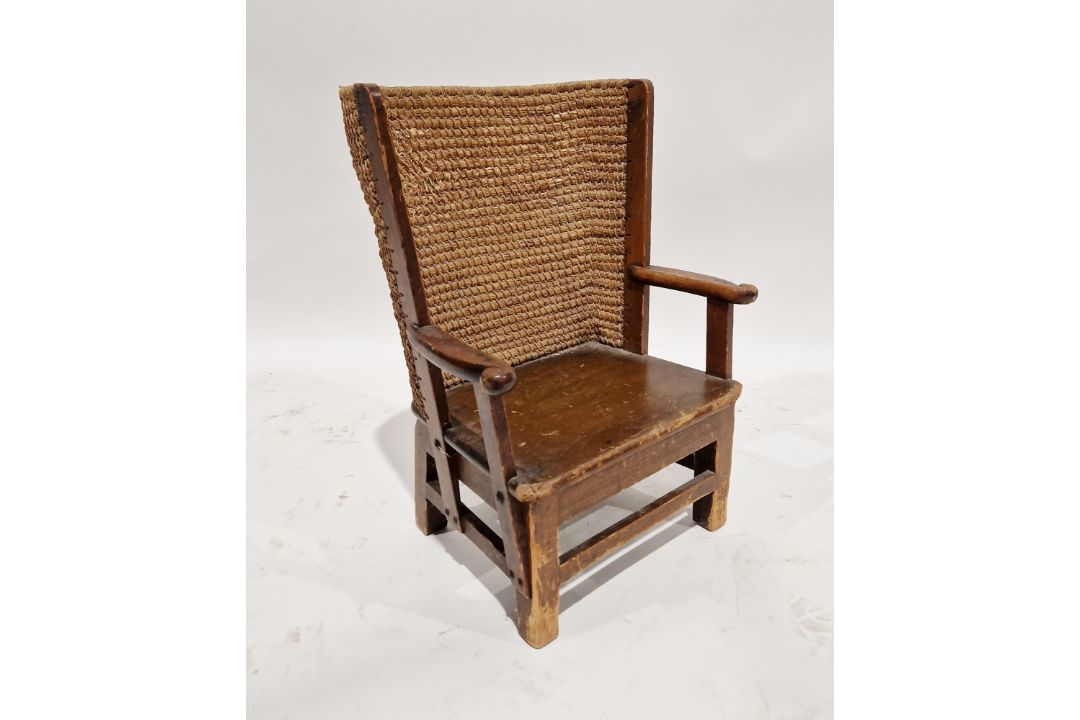 Late 19th/early 20th century pine child's Orkney chair, having woven rush seat back, 56cm high