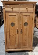 Pine kitchen cupboard, having shaped cornice, pair short drawers above cupboard with pair doors