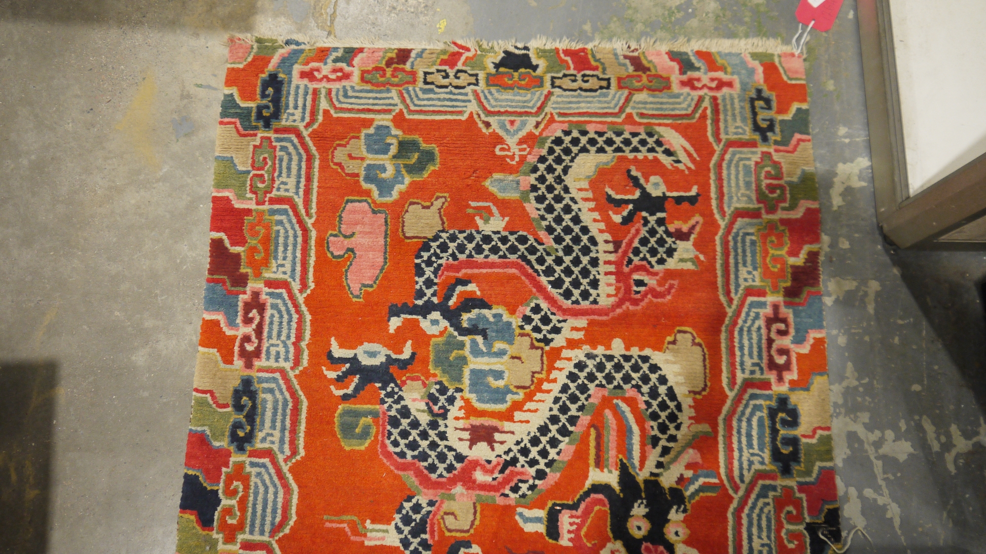 Pair of Chinese style rugs, possibly Tibetan, the central panel with two dragons chasing flaming - Image 12 of 88