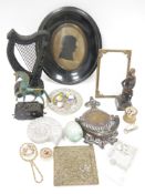 LOT WITHDRAWN Early 19th century silhouette portrait within oval ebonised frame, gilt metal, mid
