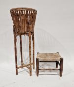 20th century bamboo jardiniere stand of circular form, raised on four legs, 73cm high, and a