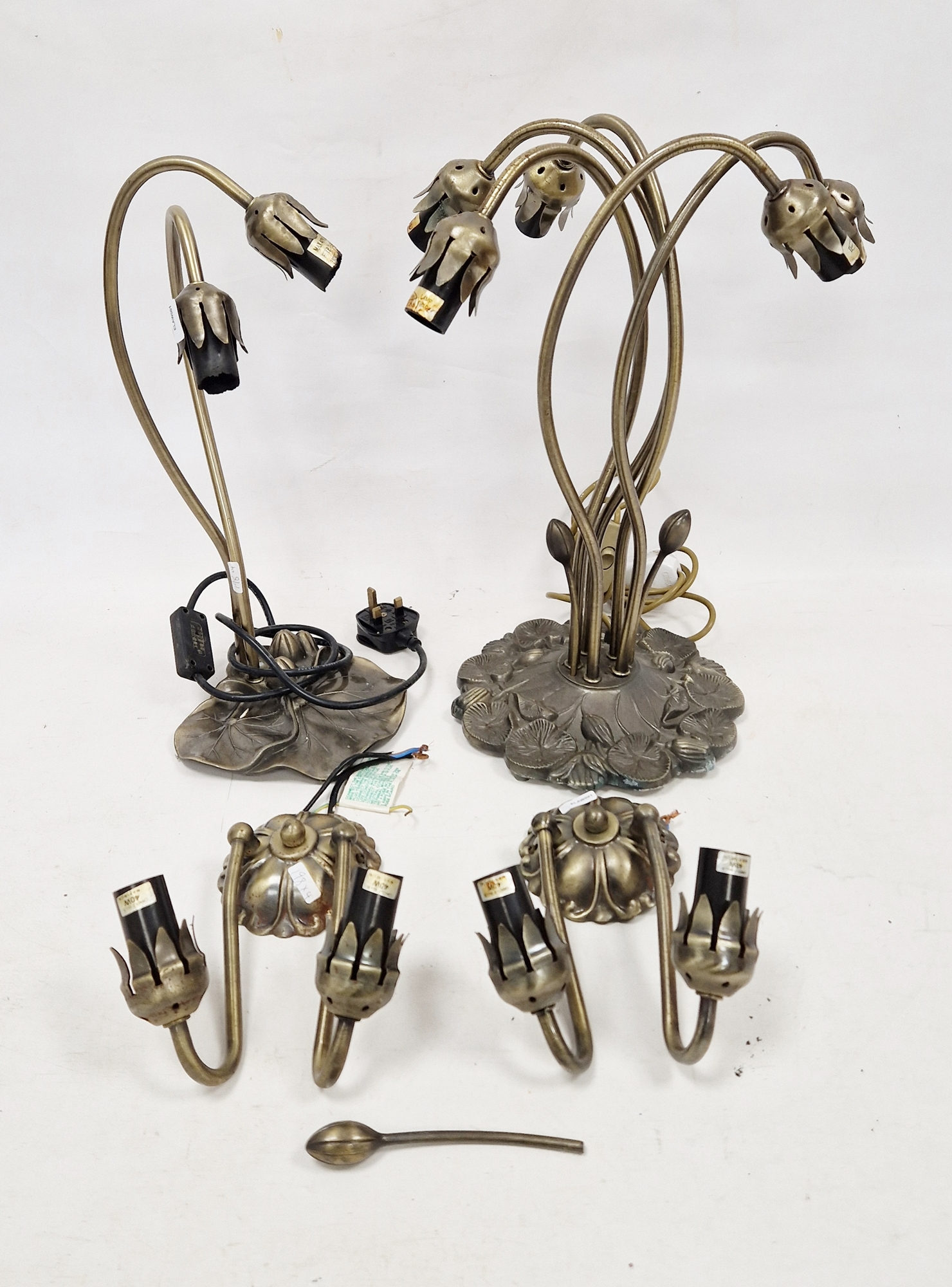 Two Art Nouveau-style bronzed metal table lamps, one twin light and the other five light, each
