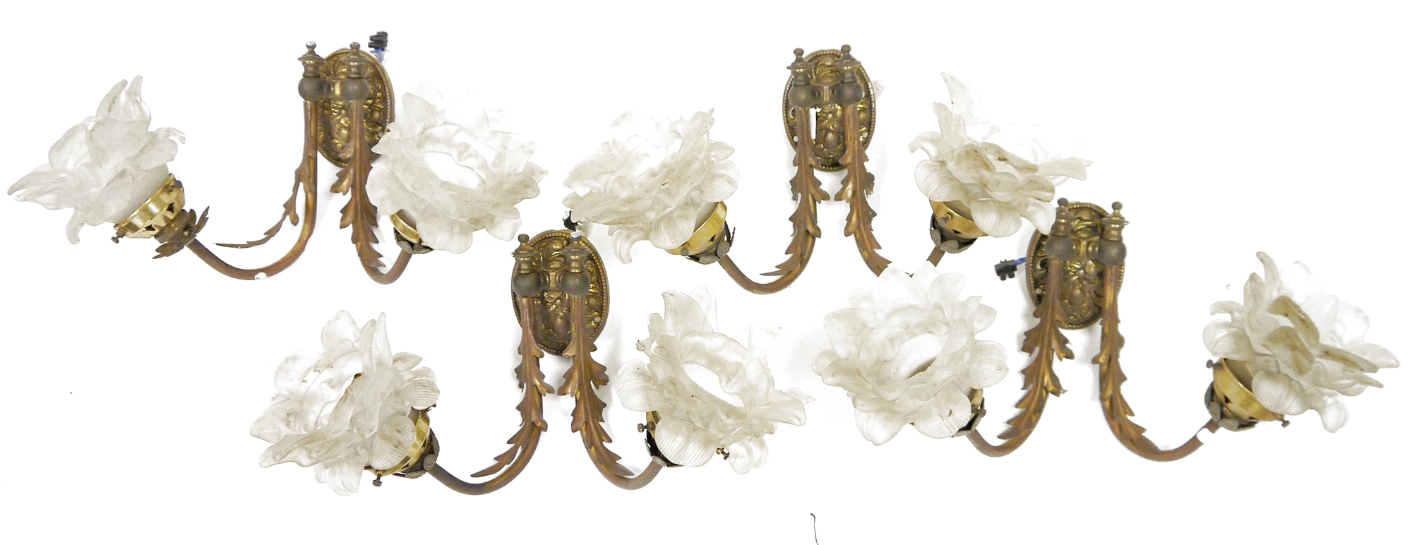 Group of gilt-metal and opaque glass wall lights, each with frosted glass petal-shaped sconces