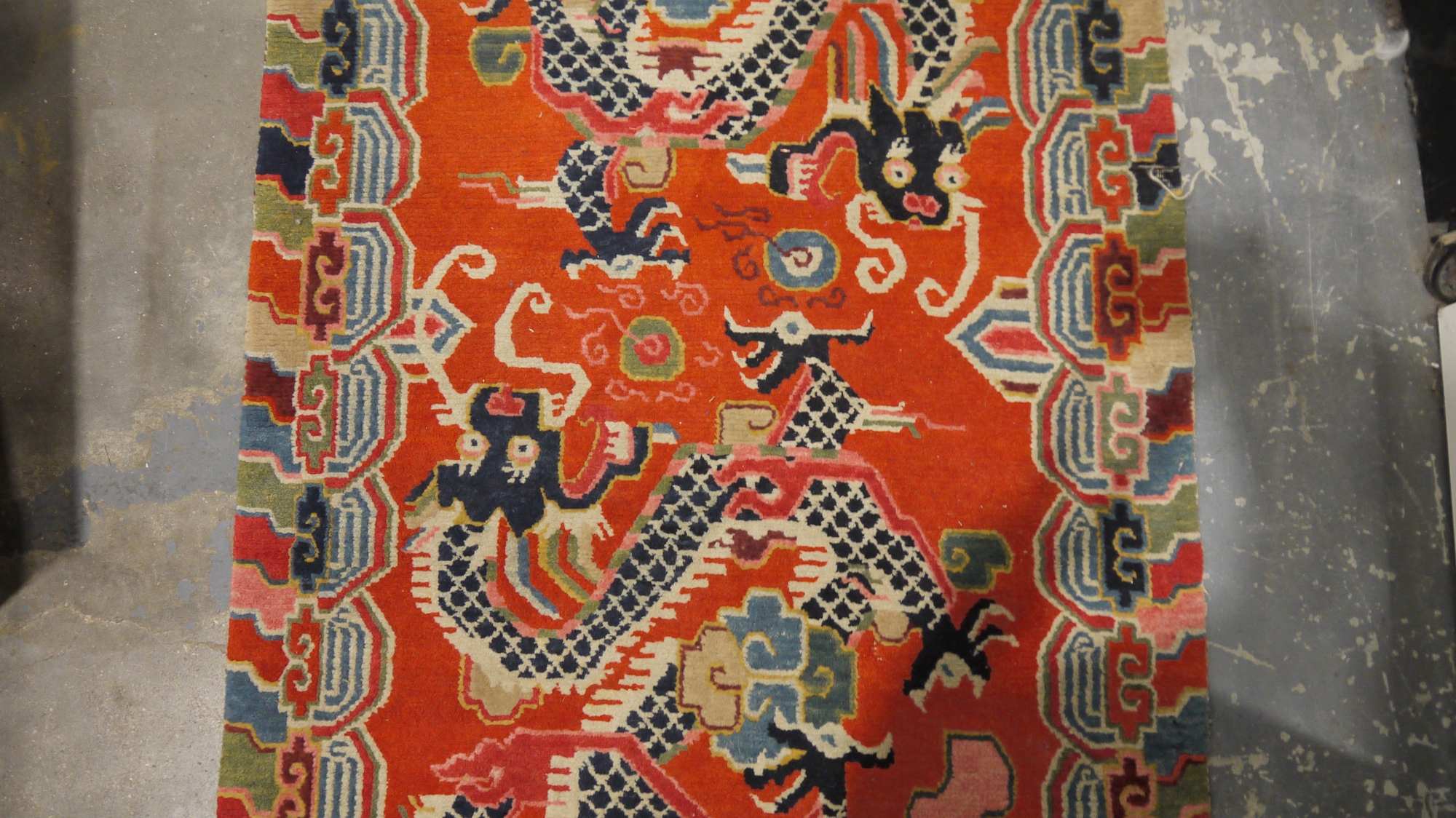 Pair of Chinese style rugs, possibly Tibetan, the central panel with two dragons chasing flaming - Image 55 of 88