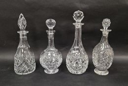Four 20th century cut glass decanters, including a Thomas Webb example variously cut with