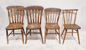 A pair of slatted back pine dining chairs, each raised on turned legs, measuring approx 89 cm