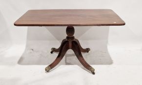 A mahogany tilt top dining table of rectangular form with rounded corners, measuring approx 72 cm
