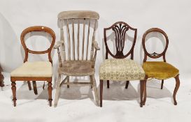 A Victorian mahogany balloon backed dining chair raised on turned front legs with upholstered