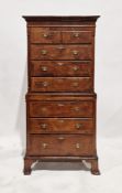 Reproduction walnut tallboy, the top section comprising two short over three long drawers, the lower