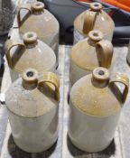 Six earthenware flagons (6)