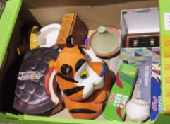 Various collectors advertising items - a Jaffa cake tin, a Kellogs Cornflakes pencil box, Tony the