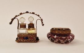 Gilt-metal filigree and 'jewelled' double perfume bottle stand with two cut glass square section