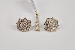 Pair 9K gold and diamond earrings, star-shaped set with numerous diamonds and a 9K diamond pendant