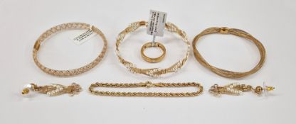 9ct gold mesh bangle, a 9ct gold plaited mesh bangle, a 9ct gold rope-pattern bracelet, a 9ct gold