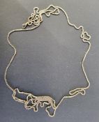 Antique gold-coloured metal guard chain of rounded square-section links