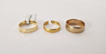 Two 9ct gold wedding bands sizes N1/2 and P1/4, 7.3g approx., another 22ct gold cut, 2.2g and an