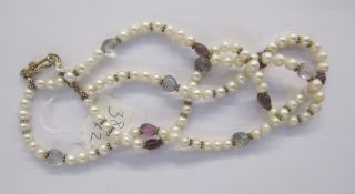 Pair double-string cultured pearls with heart-shaped amethyst-coloured stones and a Womens Voluntary