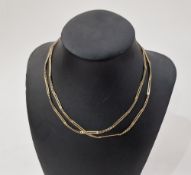 9ct gold necklace of long staple links alternating with flattened curb links, 76cm long, 11.5g