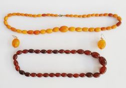 Butterscotch amber bead necklace, graduated, single-strand and a pair similar drop earrings and a