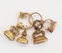 Group of four late 18th/early 19th century gold-coloured seals viz:- one oval set rock crystal and