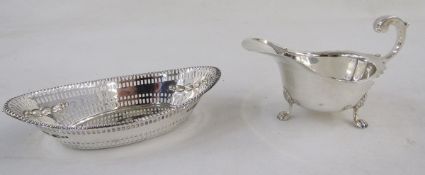 Small silver sauceboat of revived Georgian-style with free scroll handle, Birmingham assay, 3ozt
