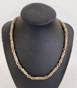 9ct gold albert chain necklace of spirally twisted staple links alternating with oval, 58g