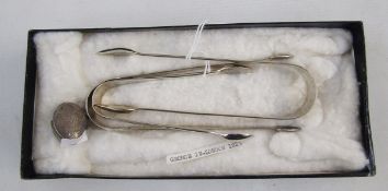 Three silver sugar tongs, comprising: a George III example of plain form, hallmarked London, 1782,