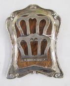 Edwardian silver easel letter rack, shape rectangular with raised scroll borders, pair folding