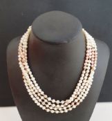 Freshwater pearl sautoir necklace, pink and cream, interspersed with gold-coloured ball spacers,