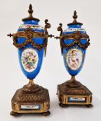 Pair of French Sevres-style gilt metal-mounted porcelain vases with fixed covers, circa 1900, from a