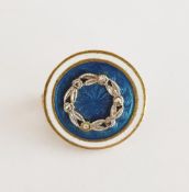 Blue and white enamel and diamond brooch, circular with white outer ring and blue guilloche