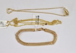 18ct gold fine chain, 2.5g, a 9ct gold curb-link type bracelet and another fine bracelet, 4.2g