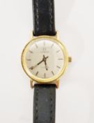 Lady’s Omega rolled gold wristwatch with baton numerals and leather strap