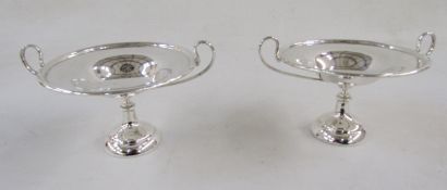 Pair of George V footed two handled sweetmeat tazzas, each with loop handles, on domed and filled