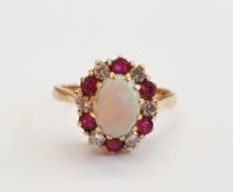 18K gold, opal, garnet and diamond ring set centre oval opal and surround of six garnets and six