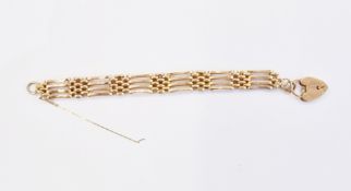 9ct gold gate and mesh pattern chain-link bracelet and the 9ct gold heart-shaped padlock clasp, 14.