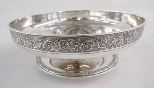20th century sterling silver footed fruit bowl on stand, cast with scrolling foliate pattern border,