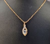9ct gold, blue and white pendant on 9ct rose gold chain  Condition Report The length is approx 54