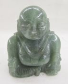 20th century carved green hardstone figure of a Buddha, modelled seated wearing a long necklace with