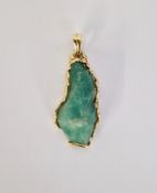 Gold mounted Colombian emerald pendant 6cm total length, the stone weighing 11g and the gold 8.9g,